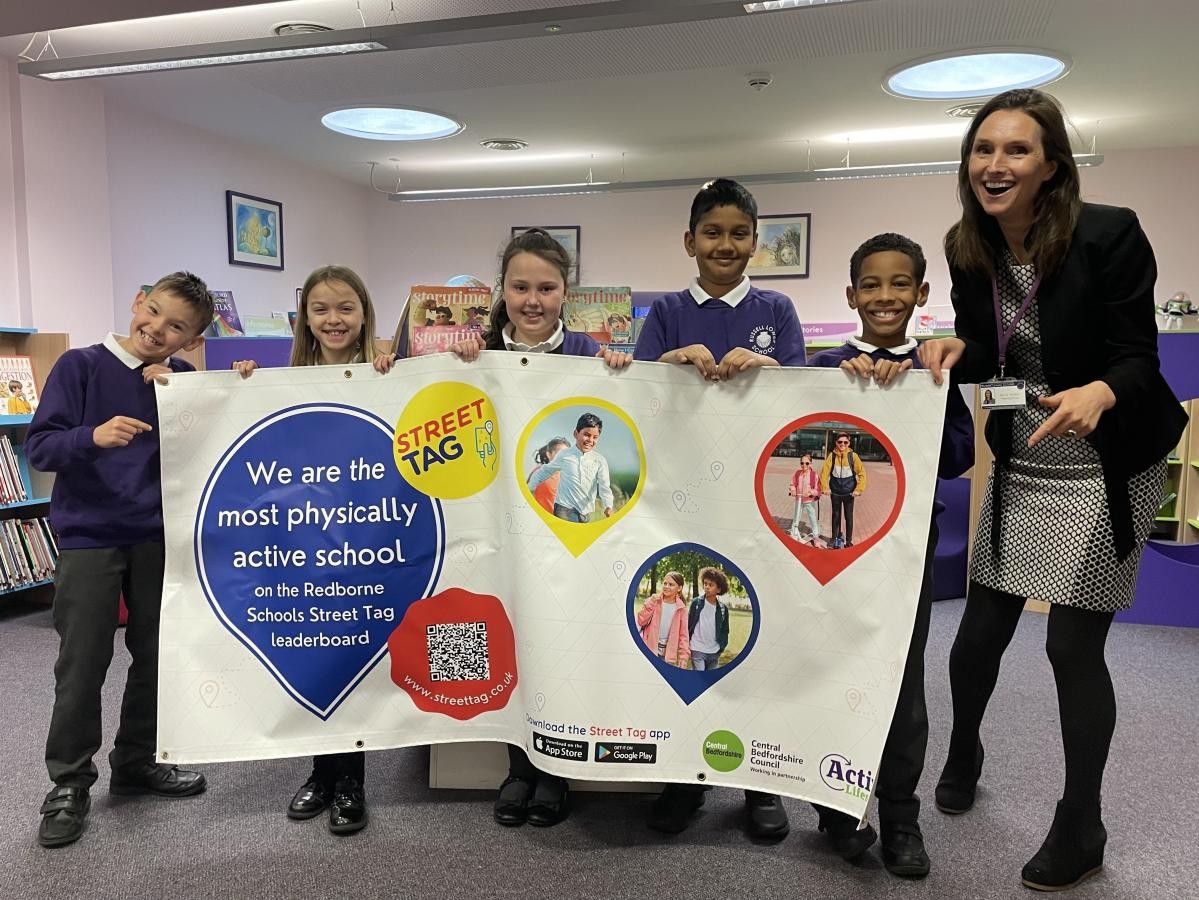 Children holding up a poster