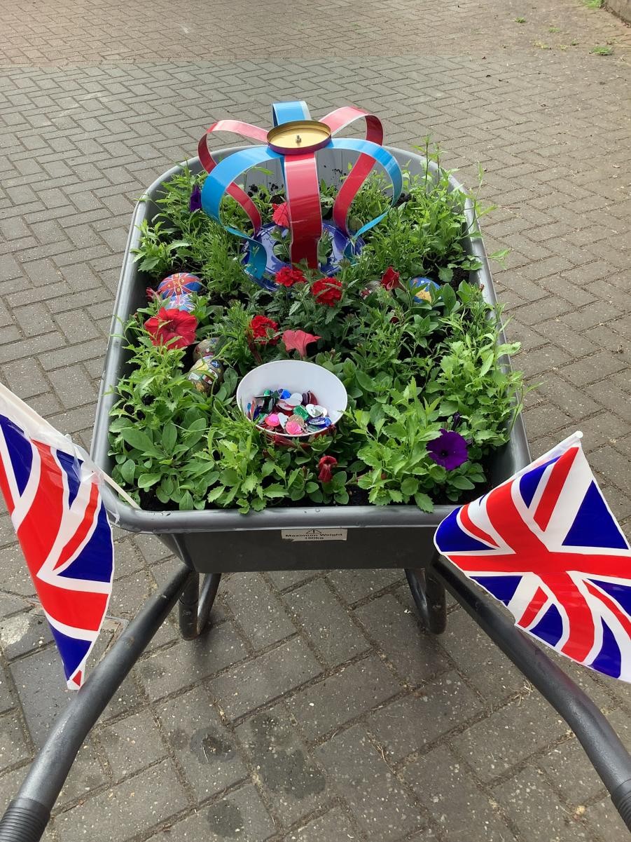 Russell Lower School Gardening Club entered the 2022 Swiss Garden (Shuttleworth) wheelbarrow competition with a Jubilee inspired entry.  May 22