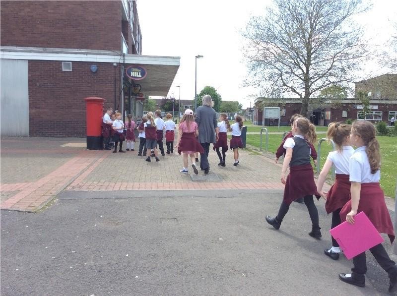 Children walking across playground