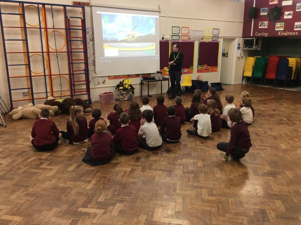 Children sat in school hall