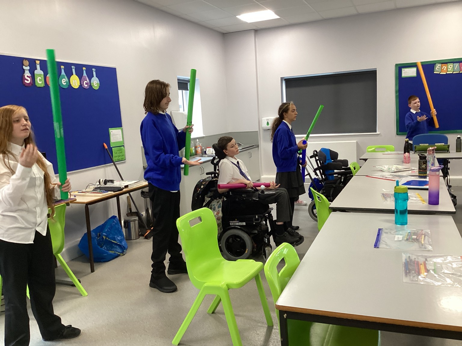 pupils playing boomwhackers