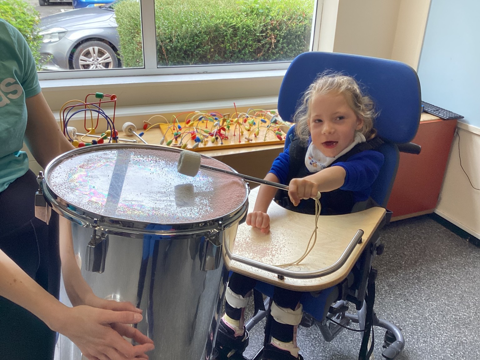 child playing drum