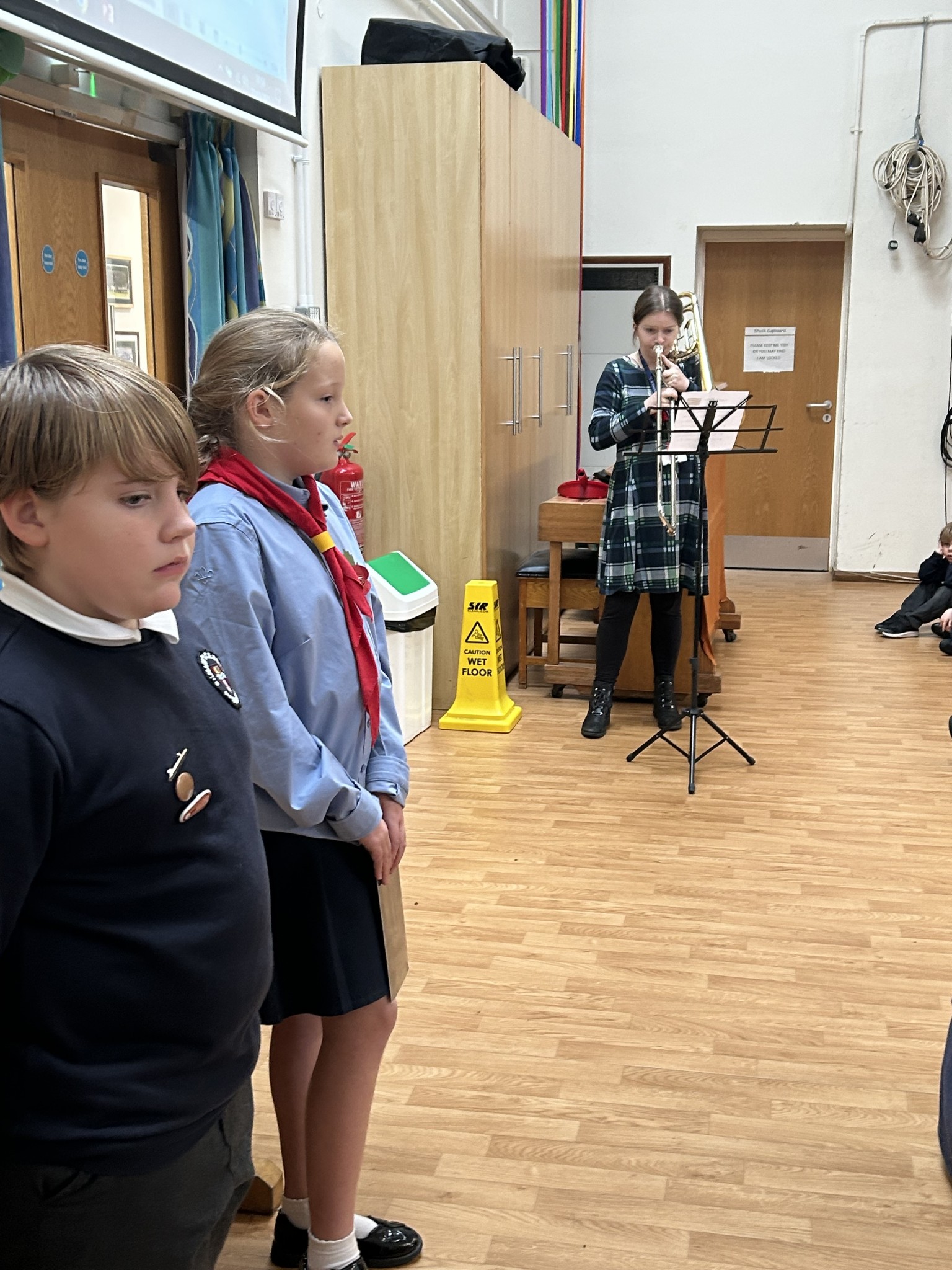 Remembrance worship at school - Miss Taylor played the Last Post