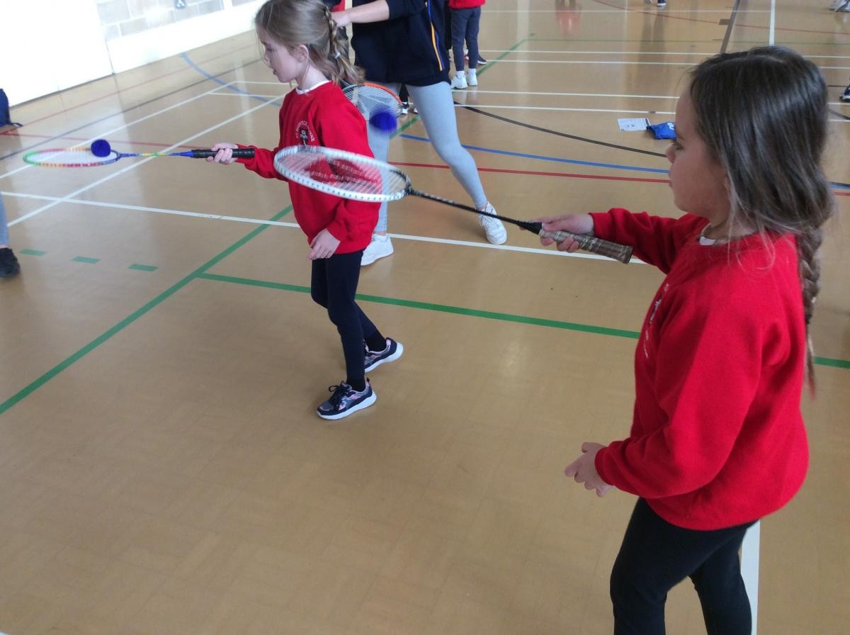 Practicing our badminton skills