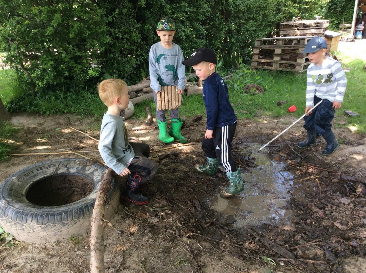 In the mud pit...