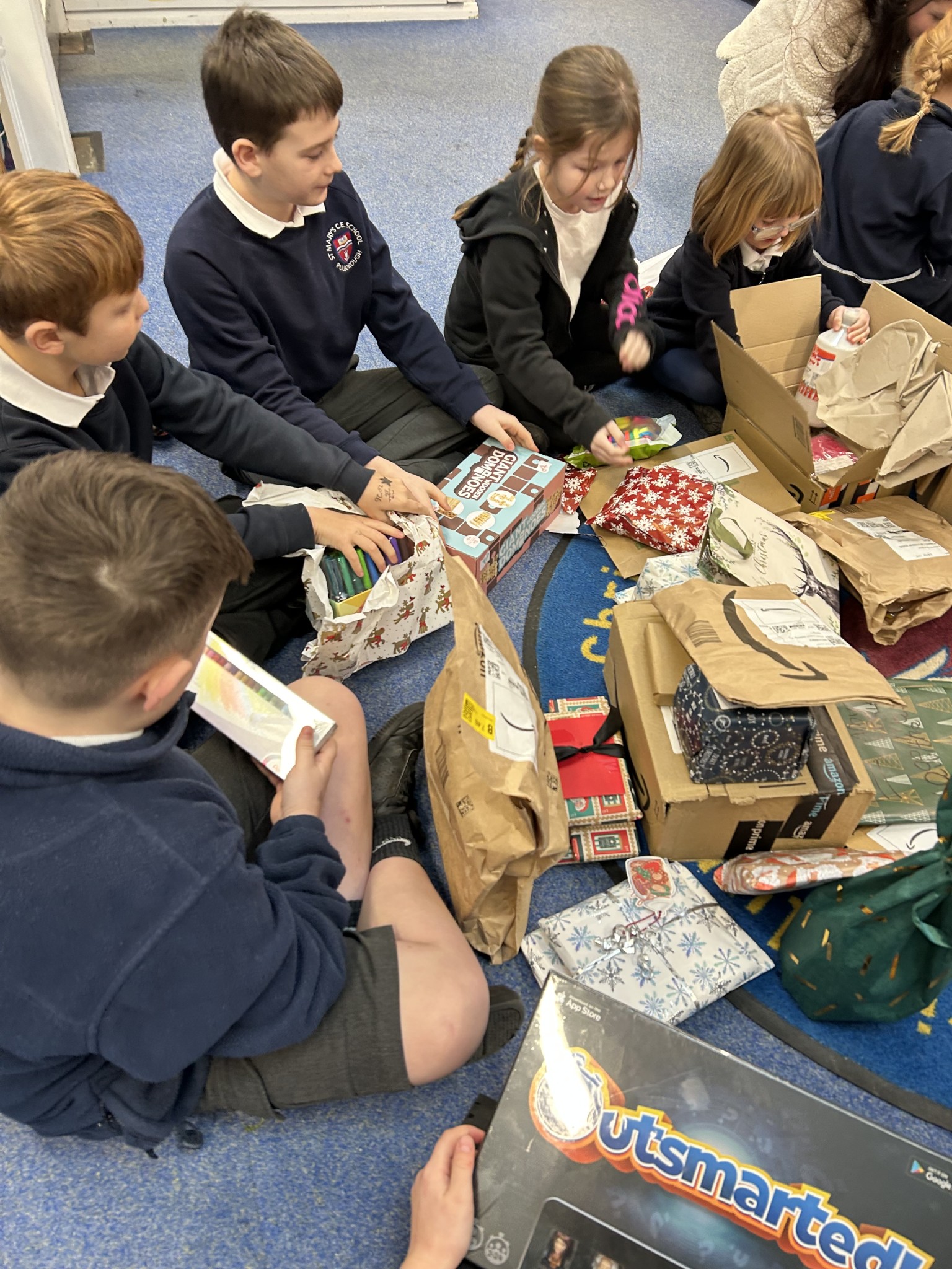 School Council opens the parcels...