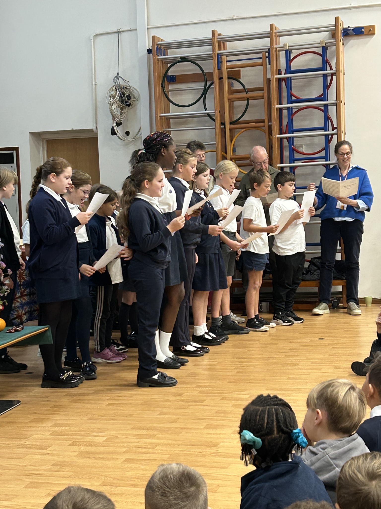 School choir sings with the church choir at the Harvest Eucharist