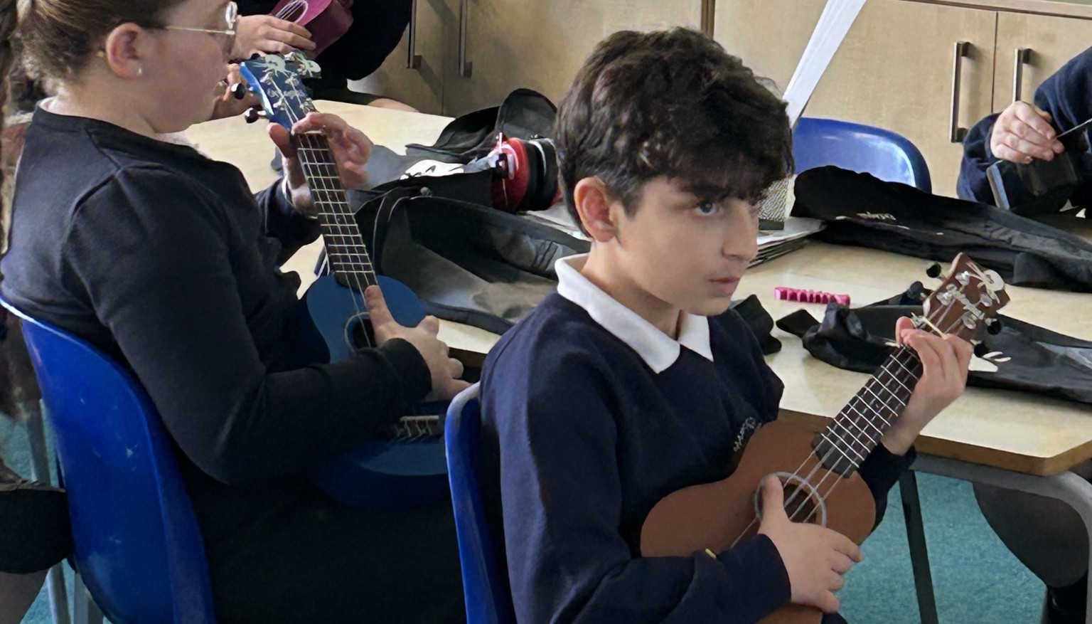 Playing the ukulele - we can do it!