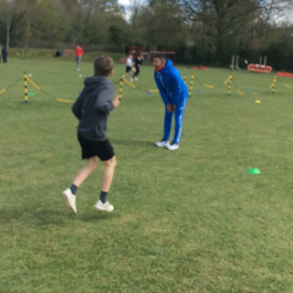 Visiting athletes inspiring the children and teaching techniques