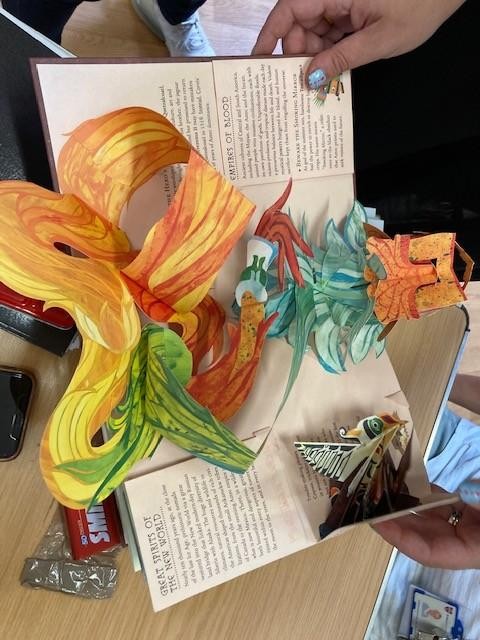 Staff looked at pop up books and we looked at the joining and how the books popped up.