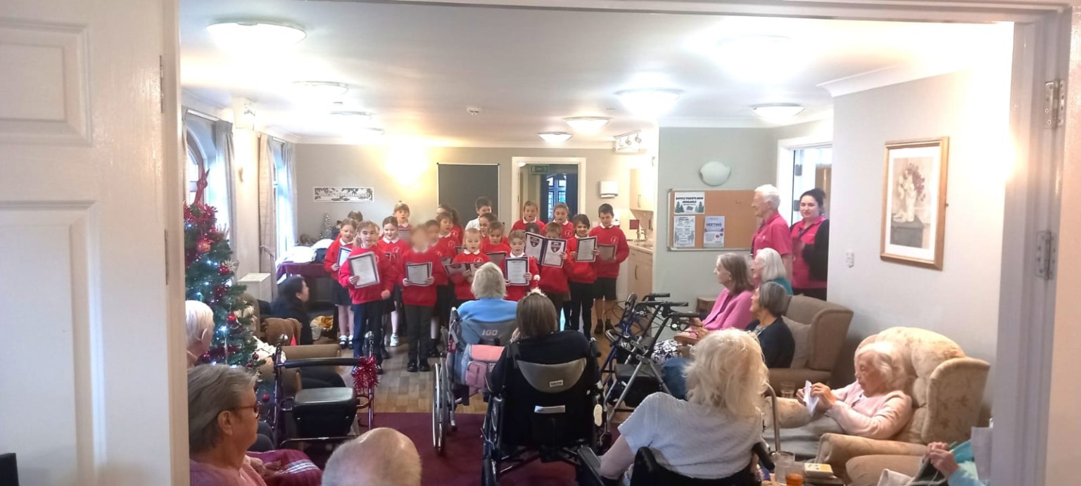 Choir sings carols at Hillside Lodge...