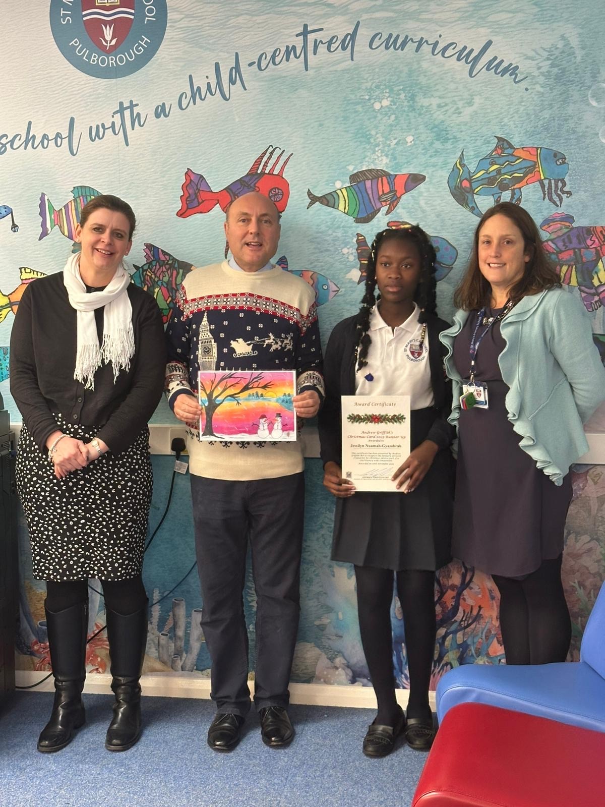 Andrew Griffith visits to present Jessilyn with her runner up prize