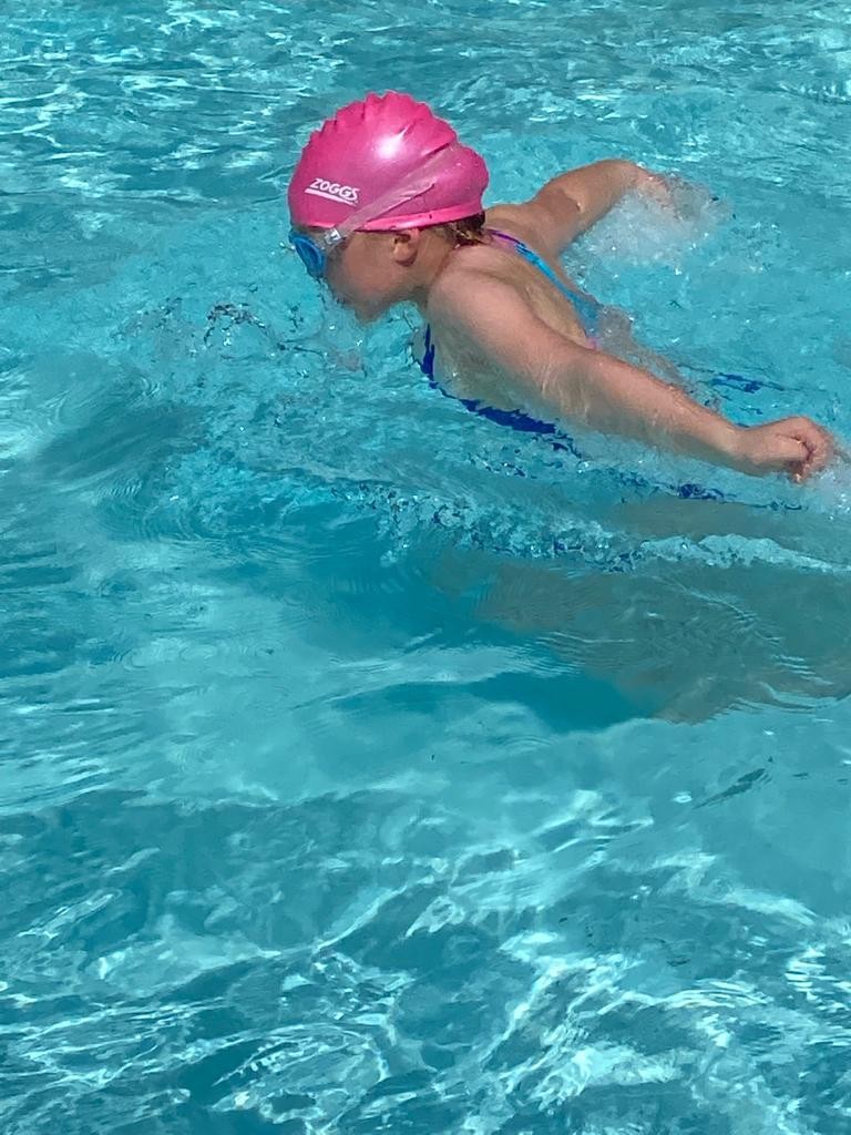 Swimming pool with progression of skills