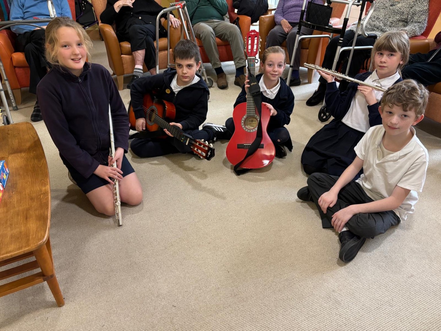 Our musicians played for the elderly persons as part of our performing curriculum