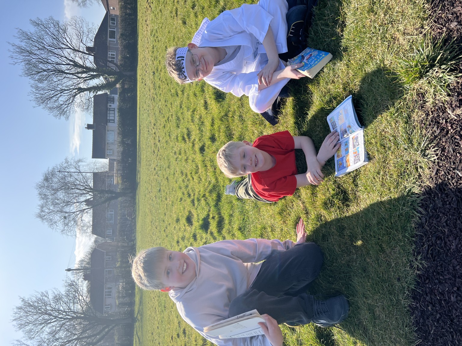 Year 6s and Year 3s reading to eachother 