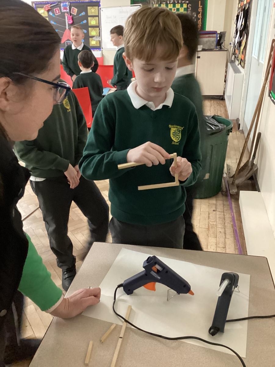 Year 4 DT lesson- Lantern making.
Using hacksaws to cut wood and glue guns to join the wood together.