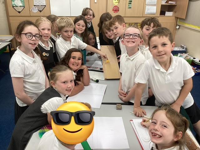 Enjoying theie science lesson focused on friction.