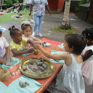 children playin g with clay