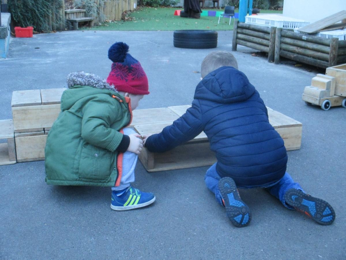 building with large wooden blocks