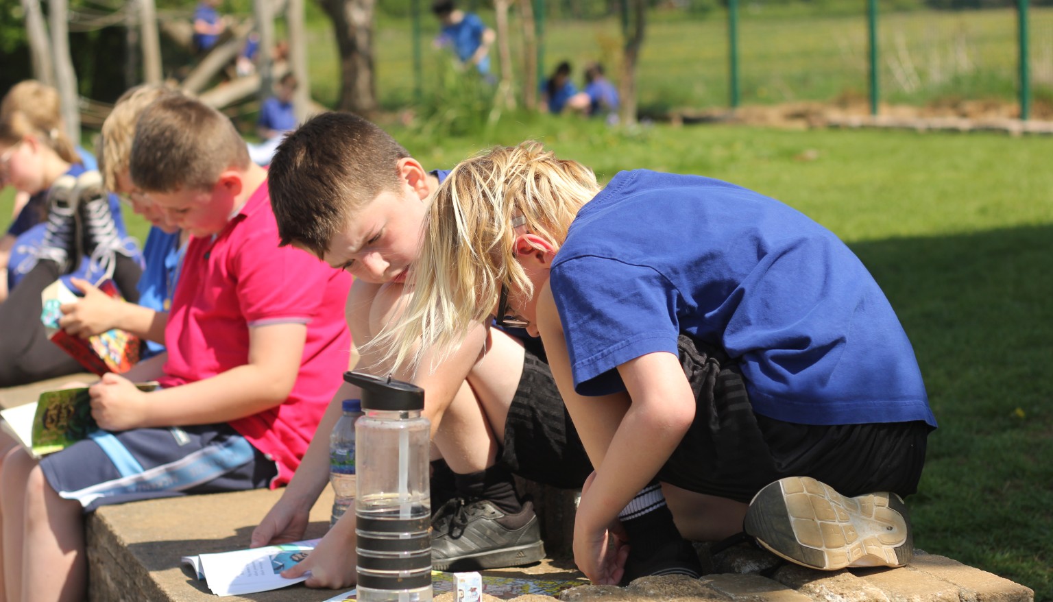 Children enjoy reading daily - especially when the weather is nice enough to read outdoors