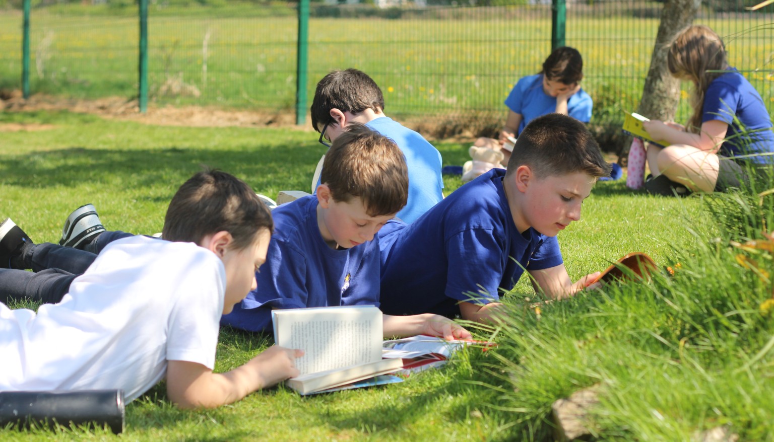 Children enjoy reading daily - especially when the weather is nice enough to read outdoors