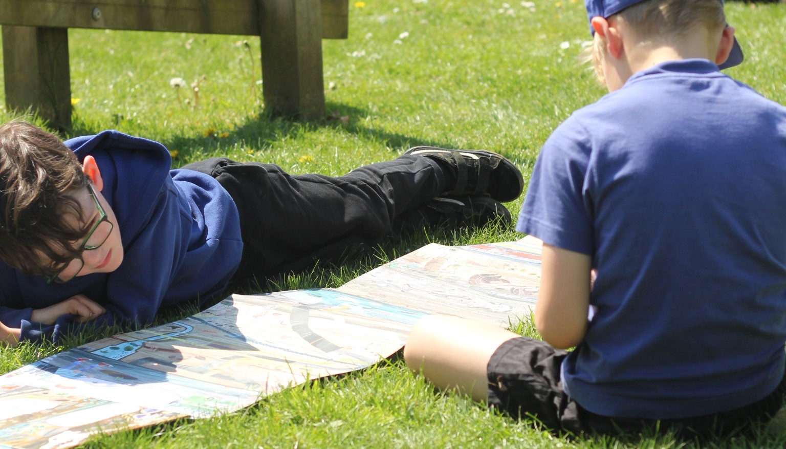 Children enjoy reading daily - especially when the weather is nice enough to read outdoors