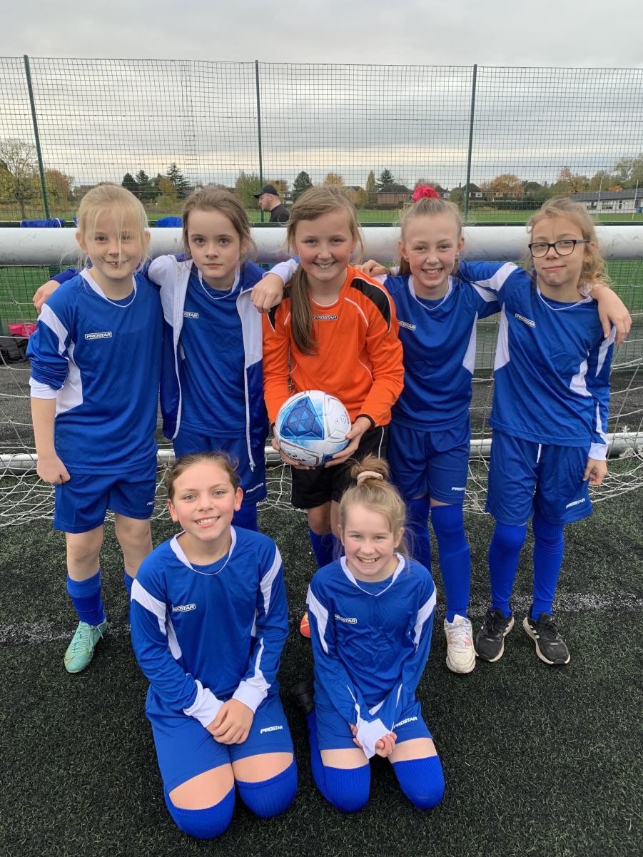Our girls football team ready for their first ever tournament.