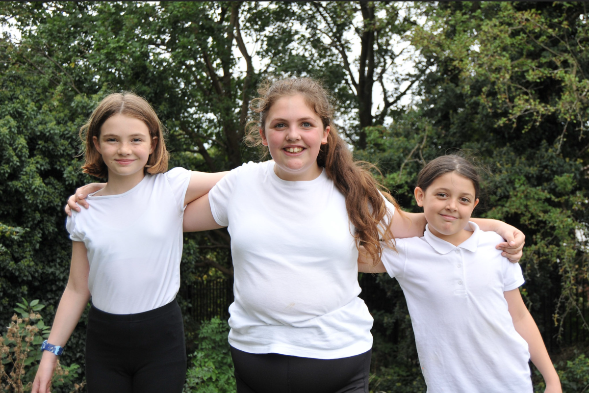 Three children stood together