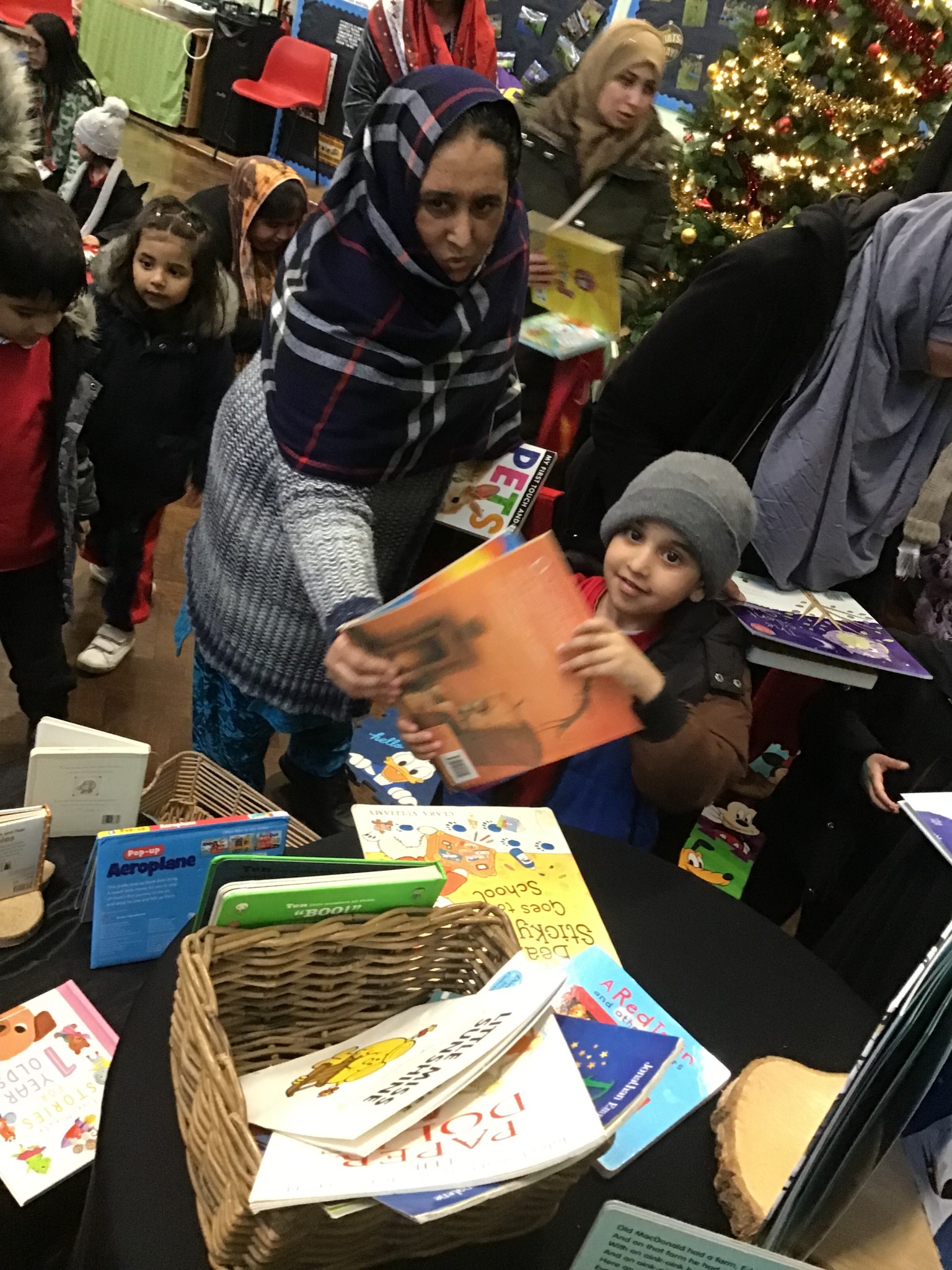 Choosing a book with their parent.