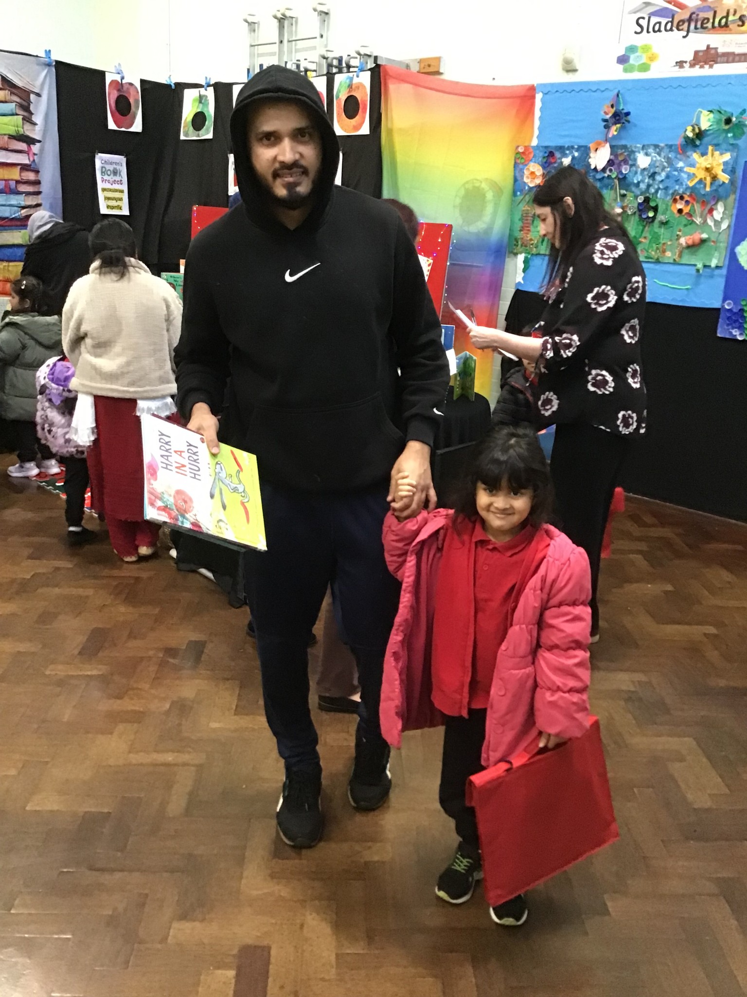 Choosing a book with their parent.