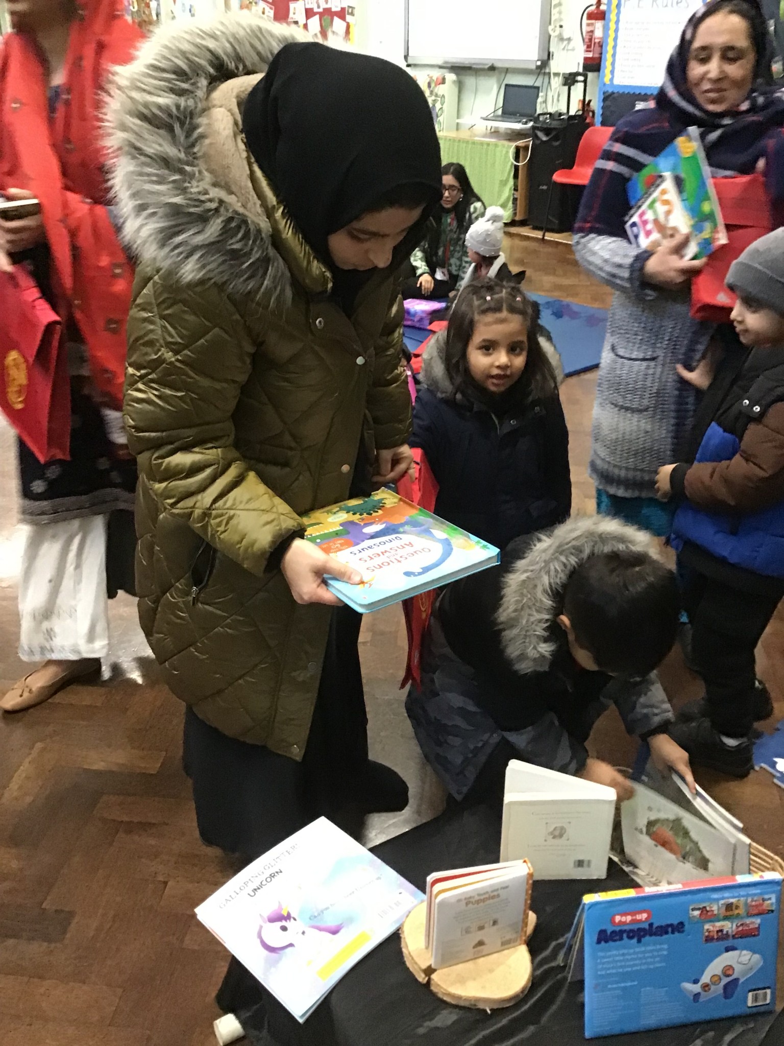 Choosing a book with their parent.