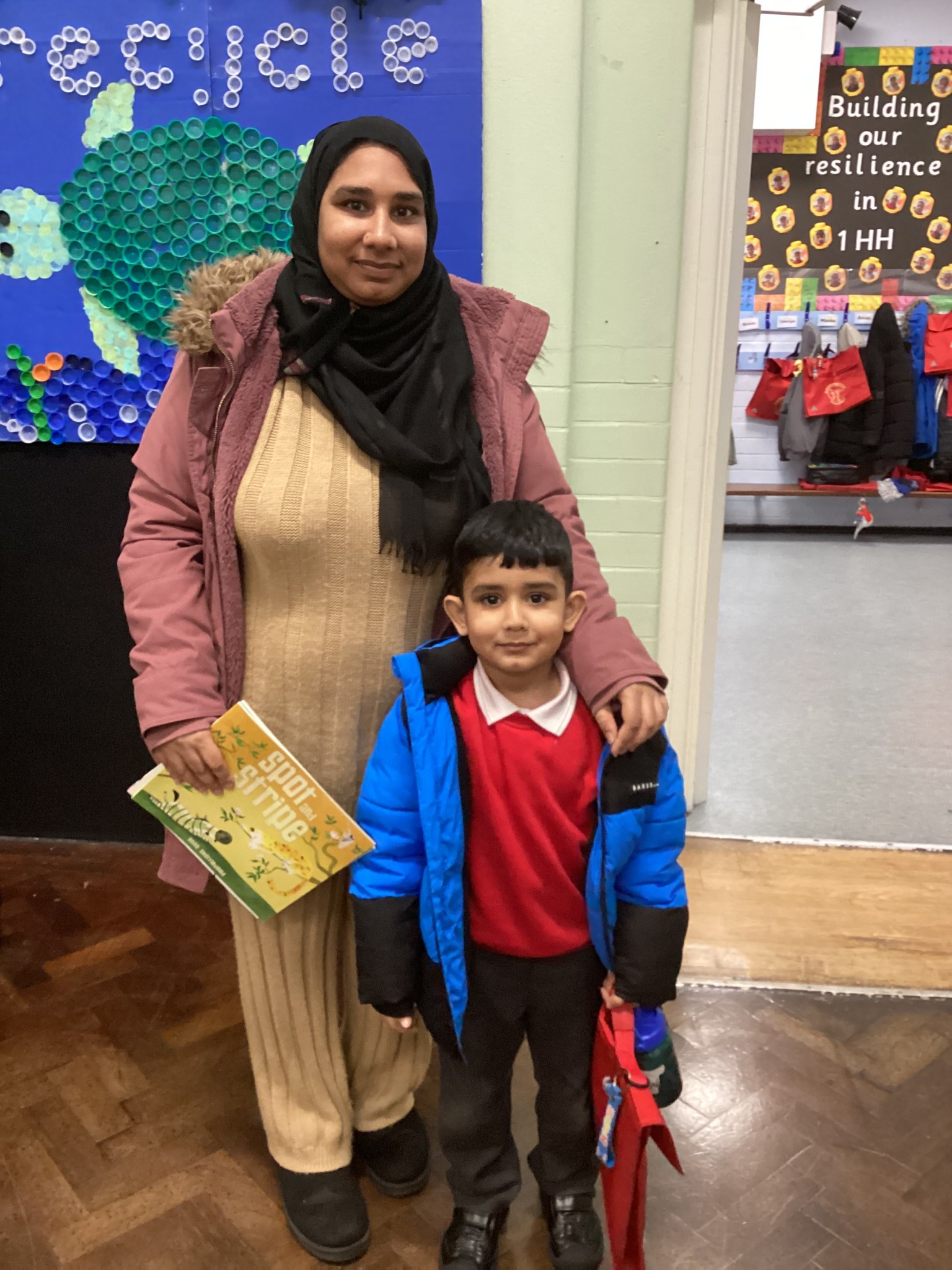 Choosing a book with their parent.