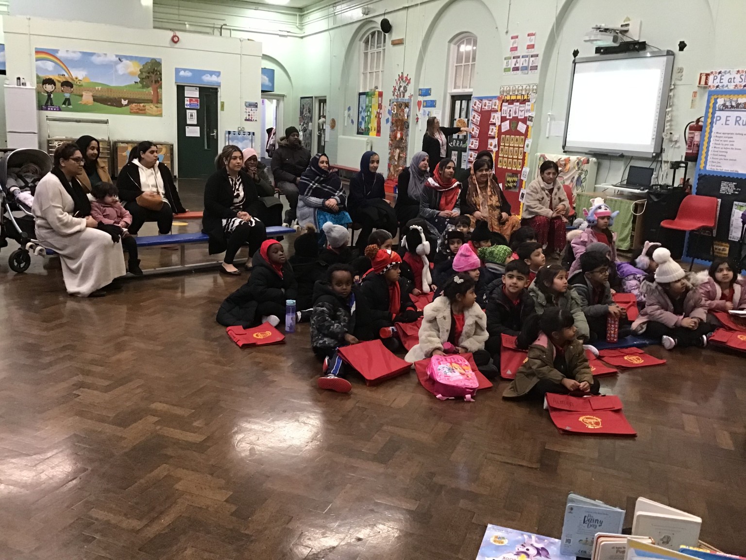 Parents listening to a story.