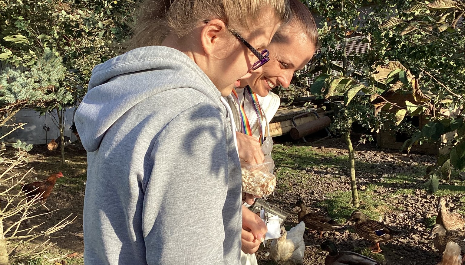 Donating food to feed the animals at the Hilltop Farm Sanctuary.