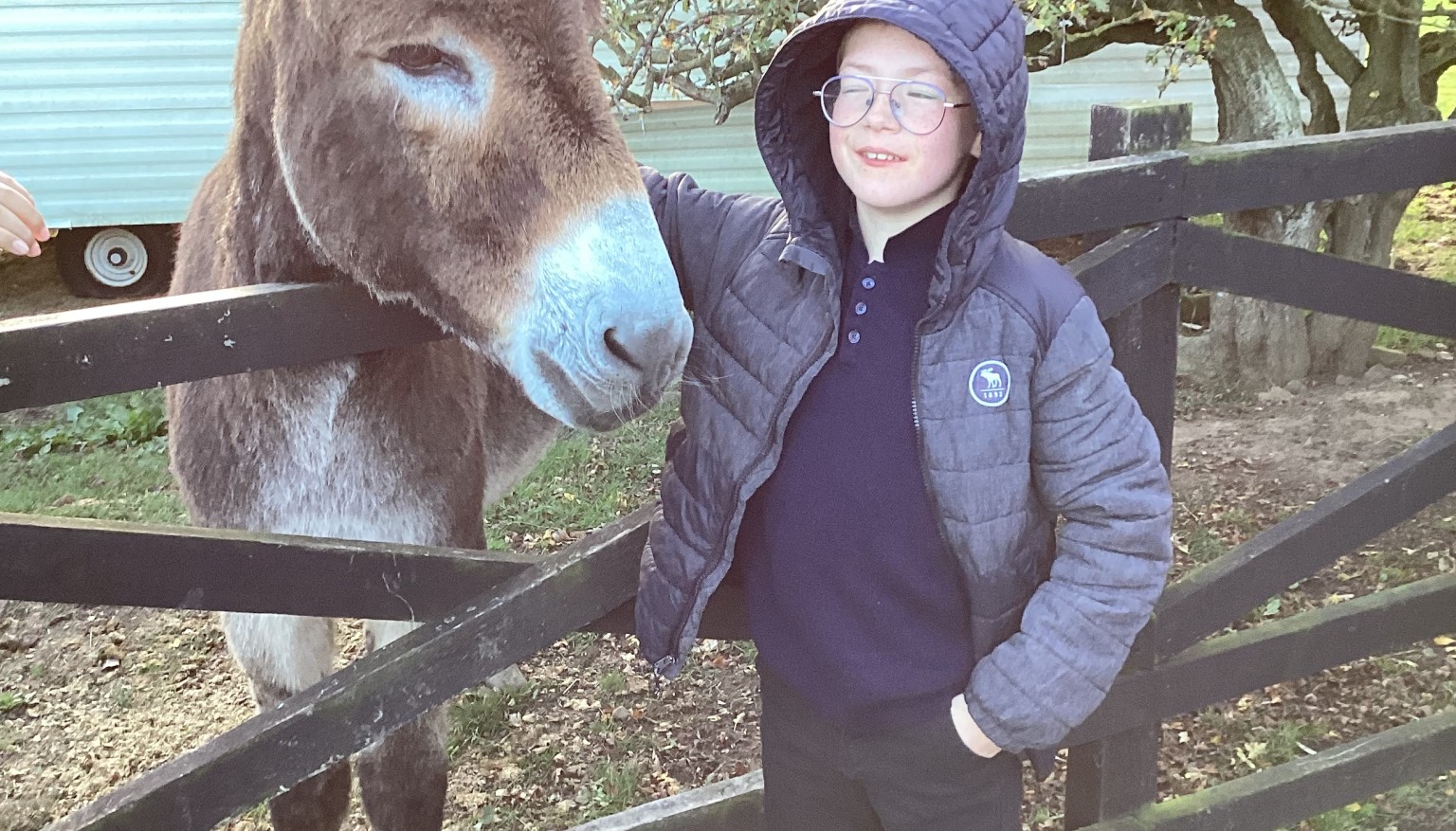 Donating food to feed the animals at the Hilltop Farm Sanctuary.