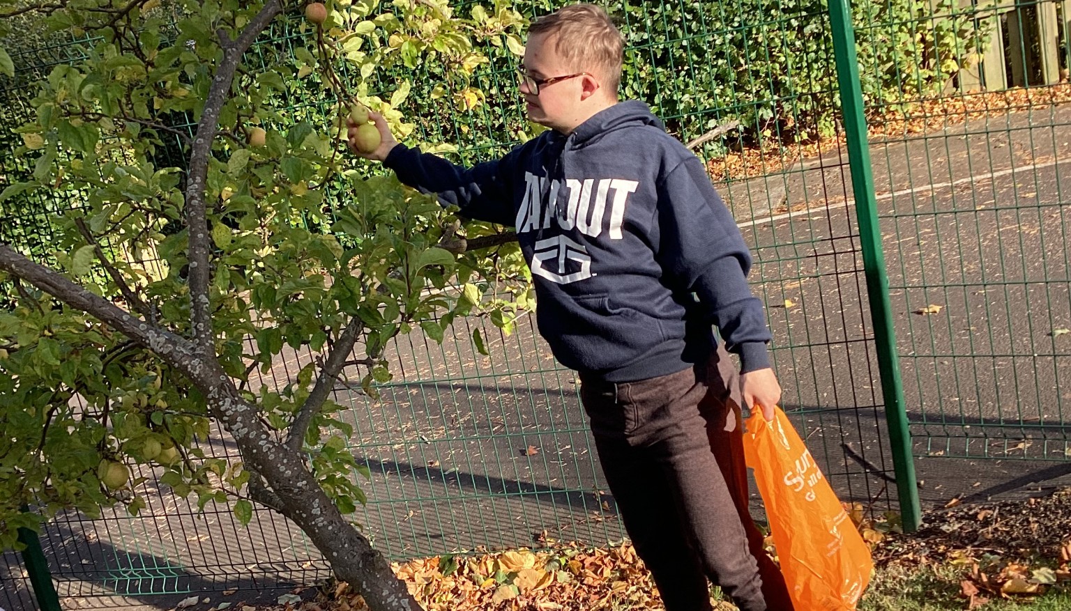 Donating food to feed the animals at the Hilltop Farm Sanctuary.
