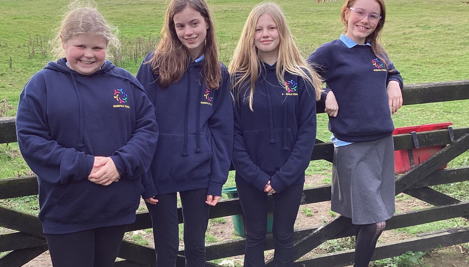 Donating food to feed the animals at the Hilltop Farm Sanctuary.