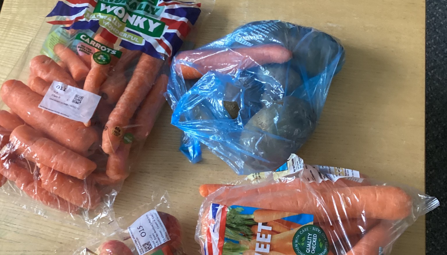 Donating food to feed the animals at the Hilltop Farm Sanctuary.